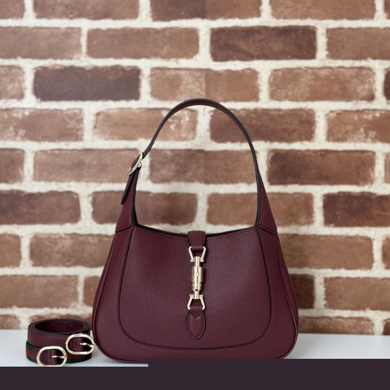 G*u*i top handle bags
